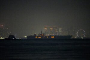 USS Abraham Lincoln sails past Singapore on way home from Middle East